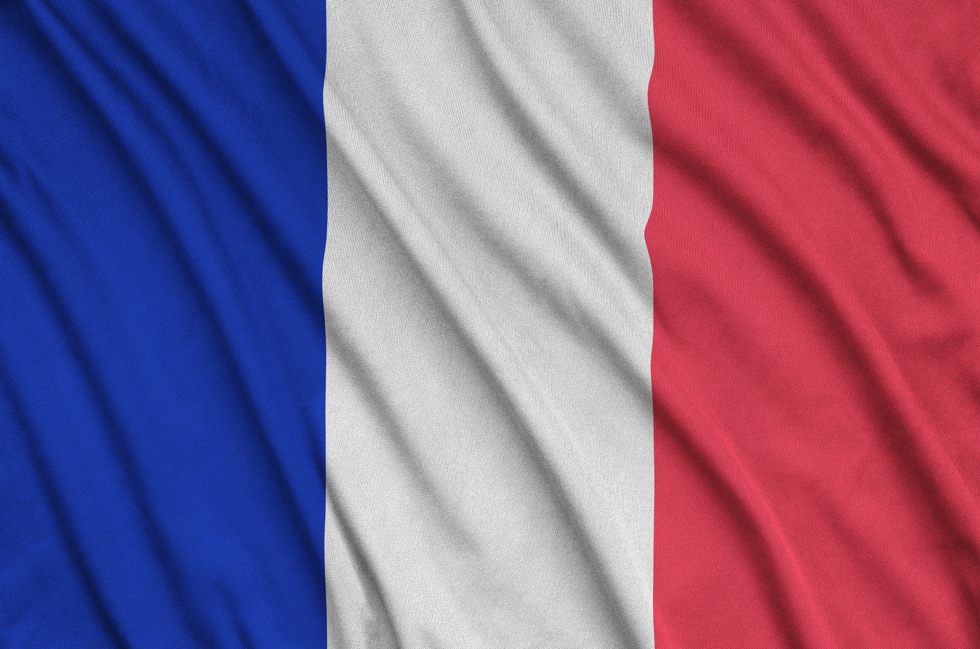 france-flag-is-depicted-on-a-sports-cloth-fabric-with-many-folds-sport-team-waving-banner.jpg